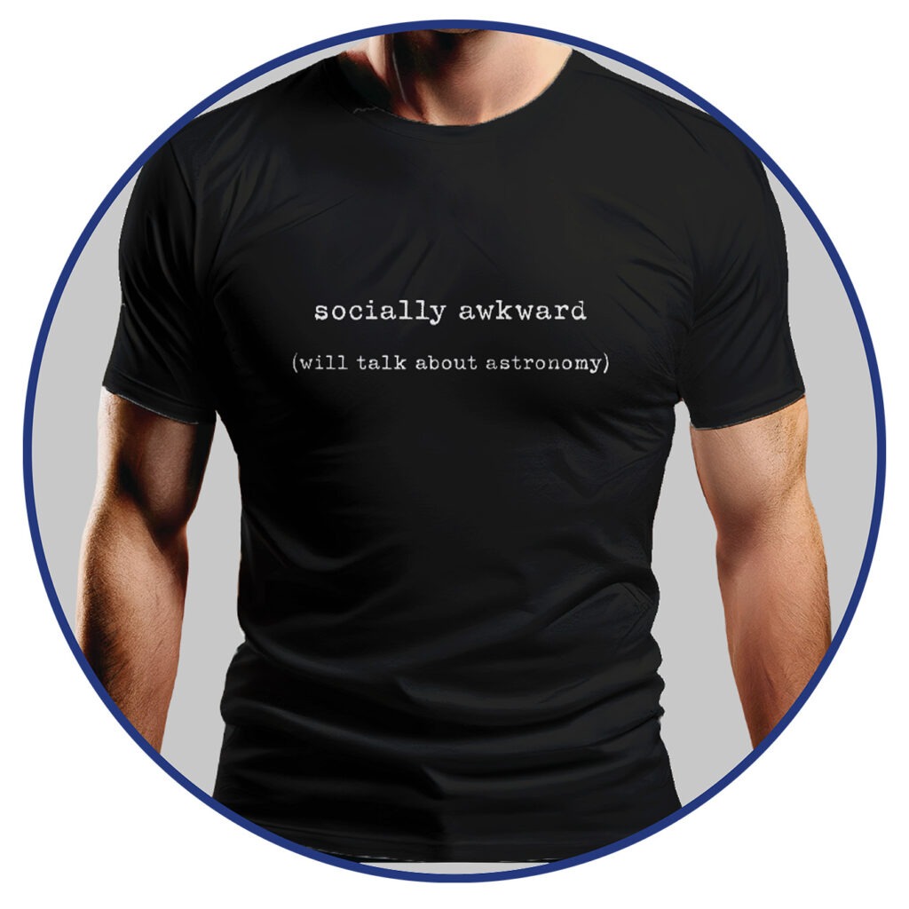 A man wears a black t-shirt reading "socially awkward (will talk about astronomy)" from Big Space Fan