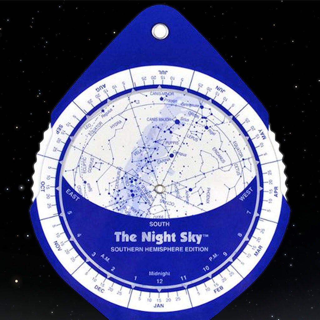 a planisphere set against a starry night sky. it's one of our top stargazing tips.